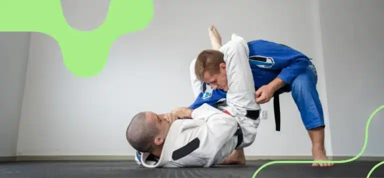 atletas de jiu-jitsu aplicando manobras